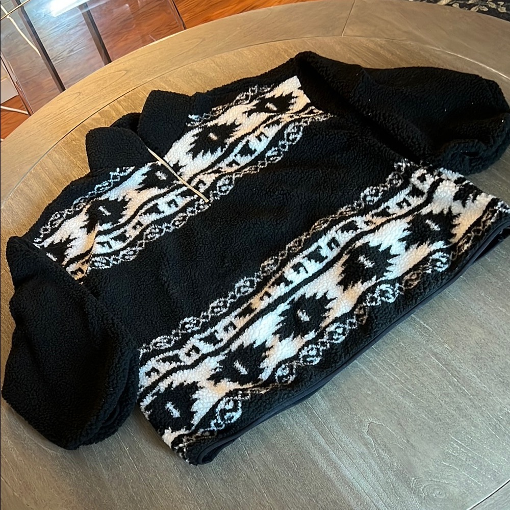 Divided Black and White Turtleneck Sweater with Nordic Design